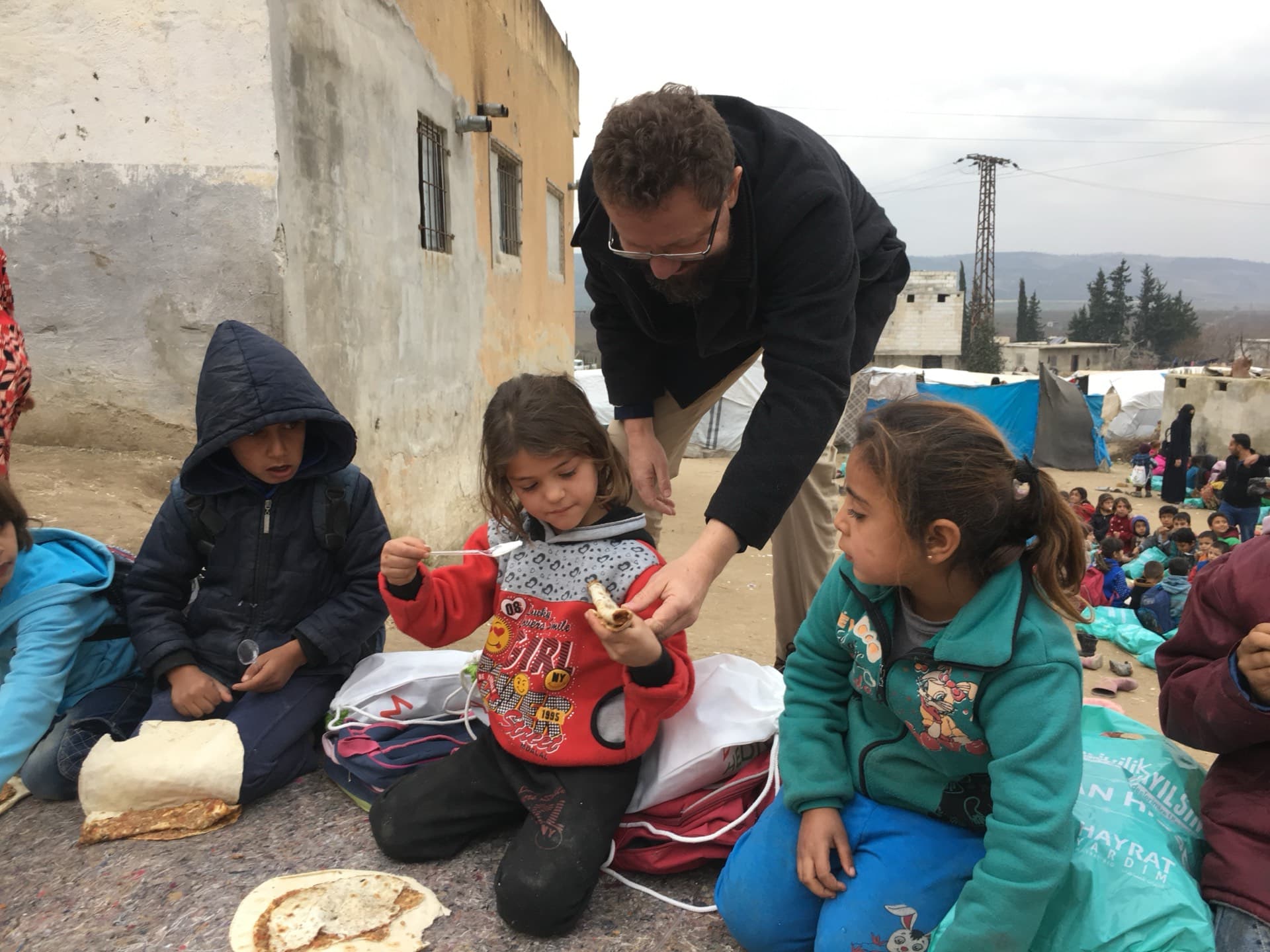 Dr. Witta helping children